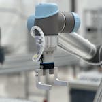 Foto de KJ Brix Close-up of a robotic arm in a modern industrial environment, highlighting technology.